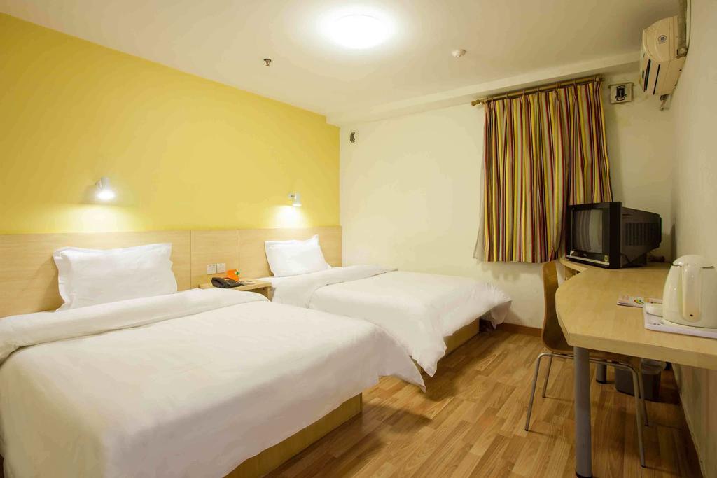 7Days Inn Guangzhou Gangding Longkou XI Road Kanton Zimmer foto