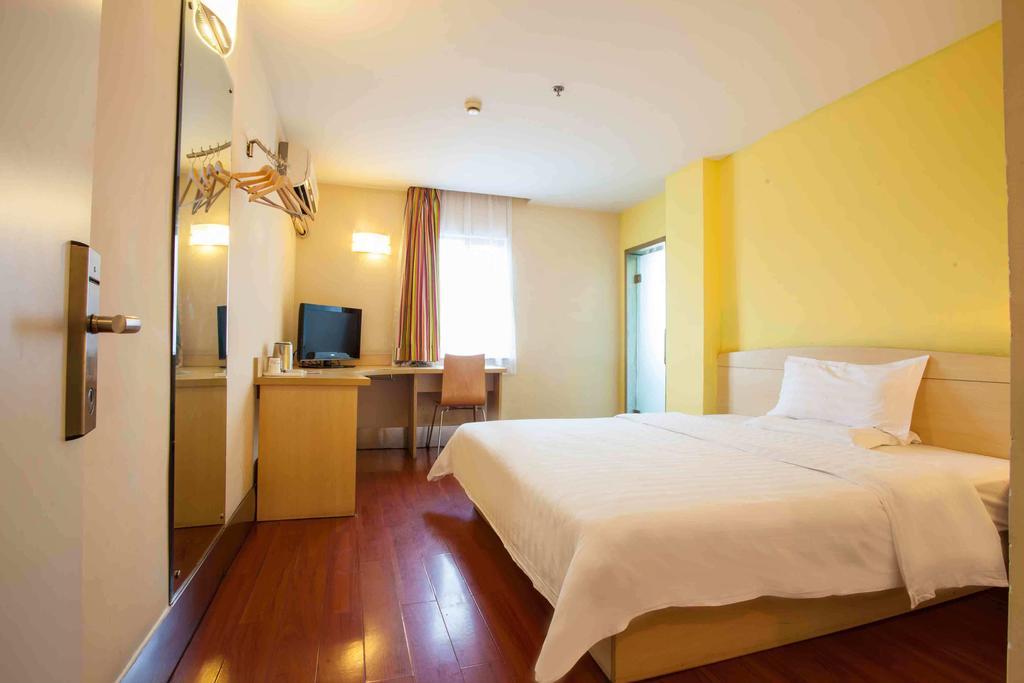 7Days Inn Guangzhou Gangding Longkou XI Road Kanton Zimmer foto