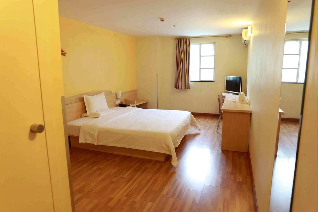 7Days Inn Guangzhou Gangding Longkou XI Road Kanton Zimmer foto